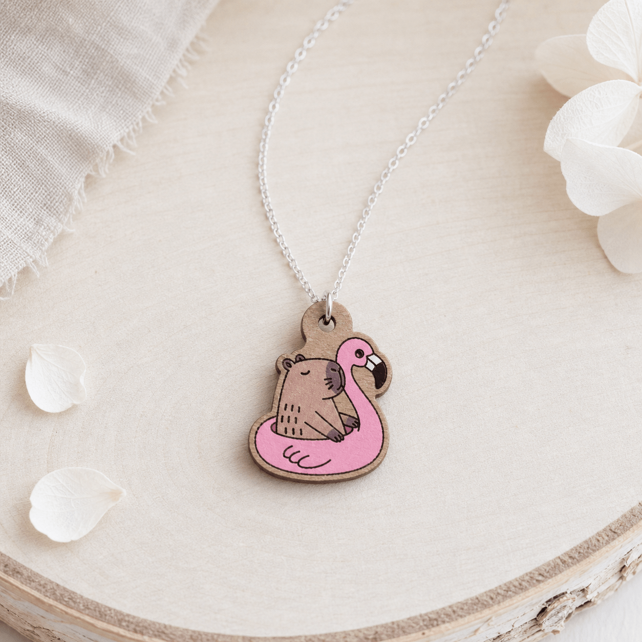 Cara - Capybara Ride On Inflatable Flamingo Necklace - Robin Valley Official Store