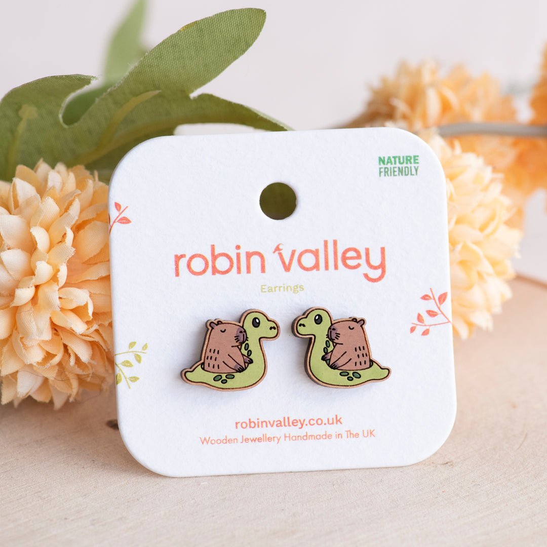 Cara - Capybara Riding Dinosaur Float Earrings - Robin Valley Official Store