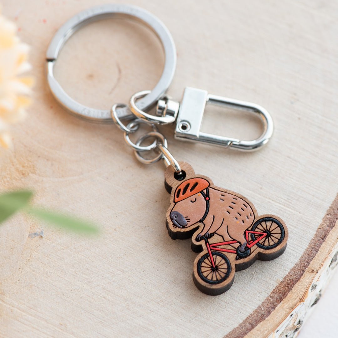 Hand - painted Capybara Cyclist Wooden Keyring - KL20499 - Robin Valley Official Store